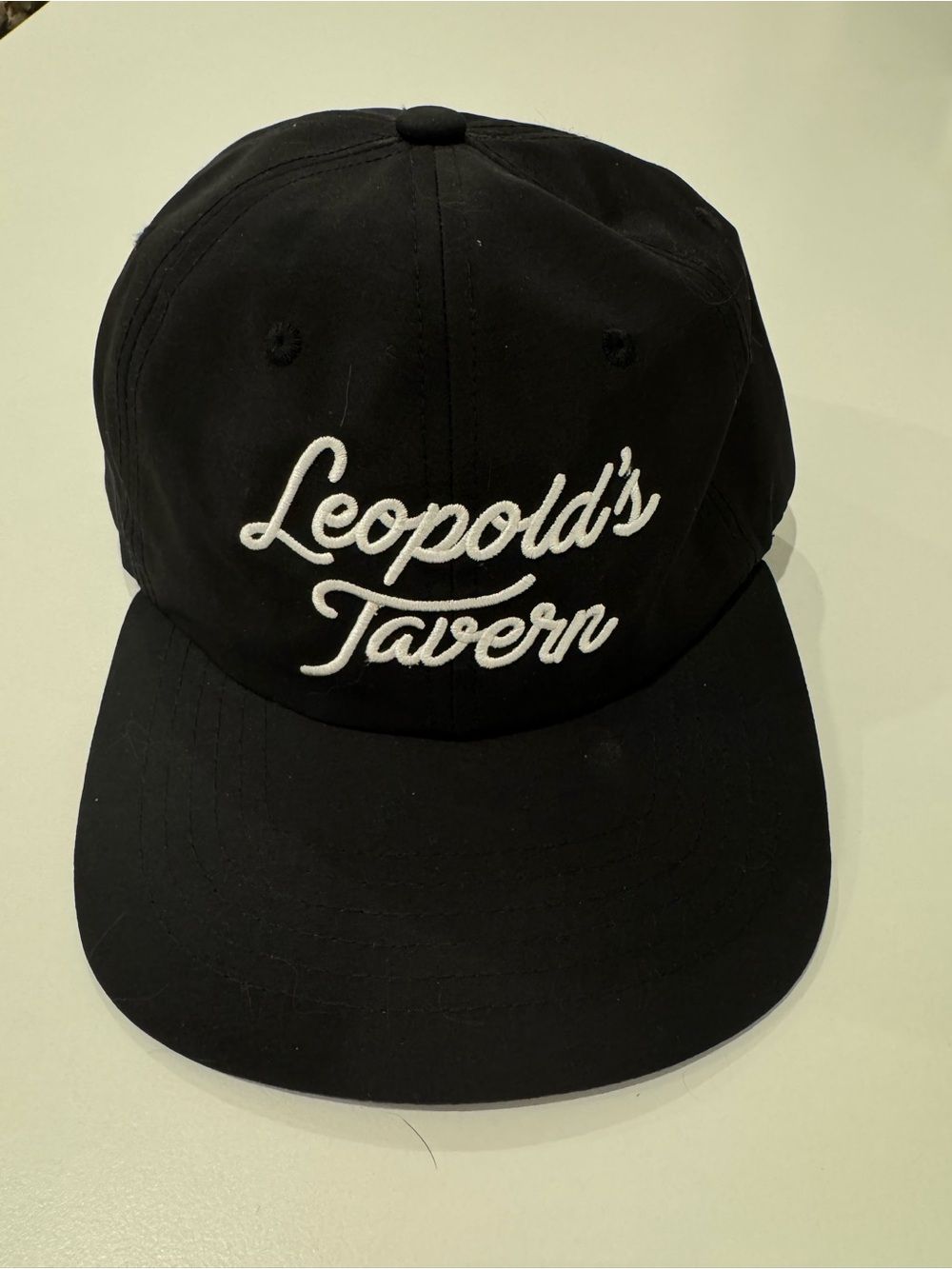 Black Leopold’s Tavern logo Embroidered Baseball Cap. Nylon materials. Like new